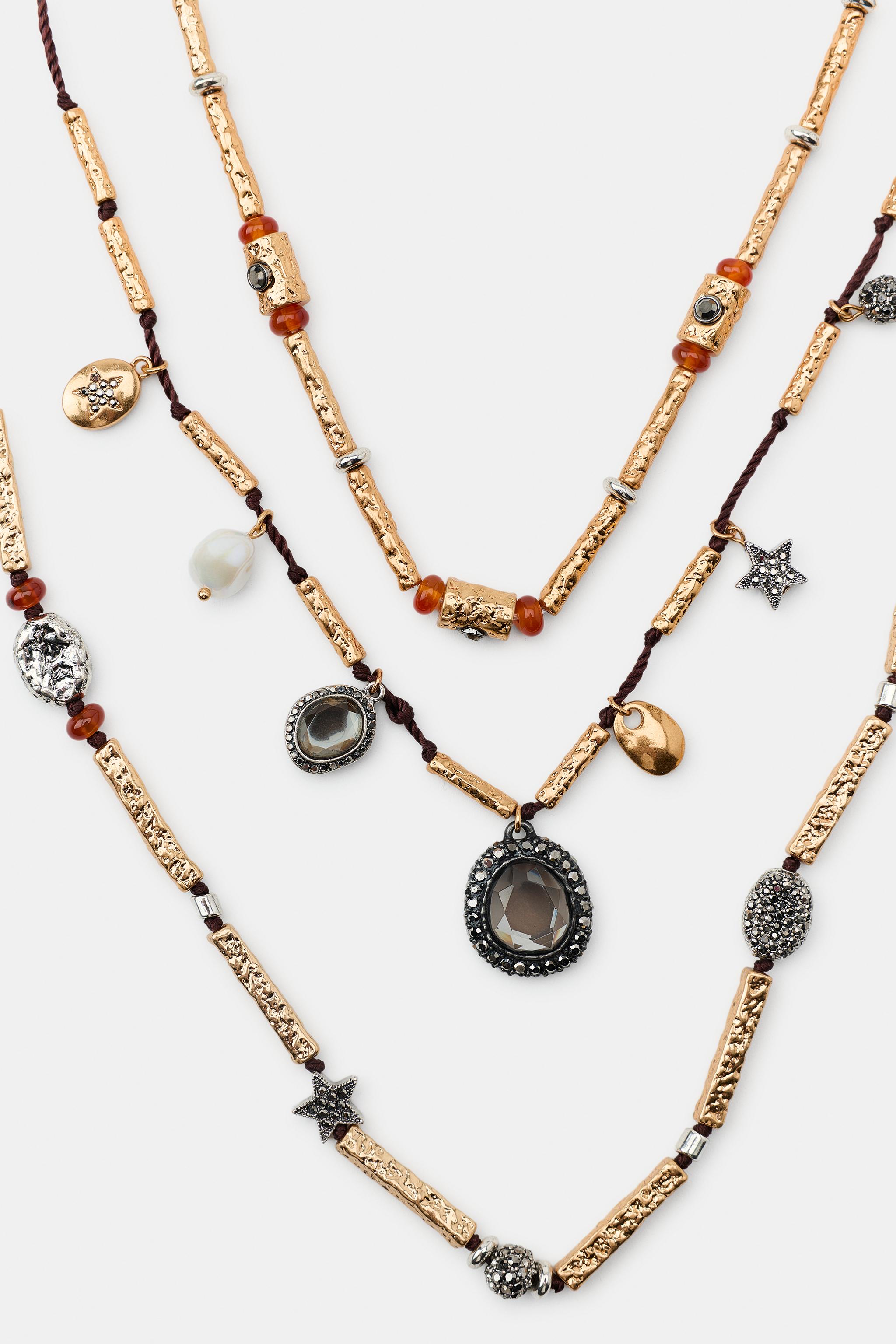 PACK OF 3 CORD NECKLACES WITH CHARMS AND JEWELS